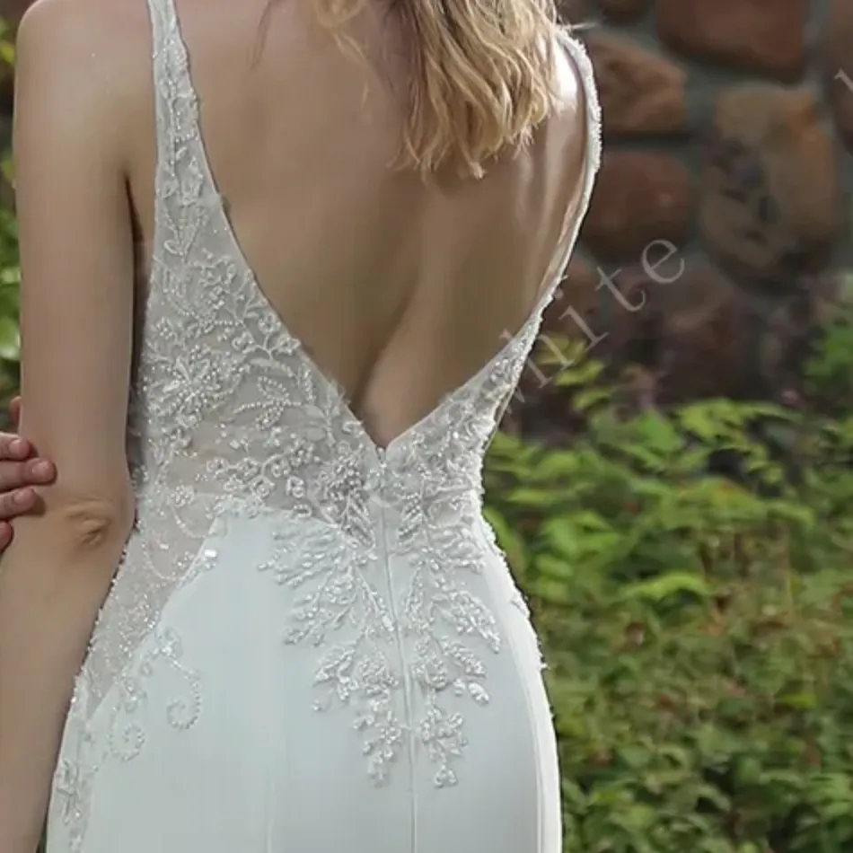 Beaded Fit And Flare Dress With V Neckline And Crepe Skirt